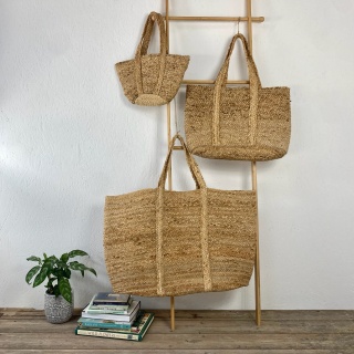 Large natural jute storage bag with handles